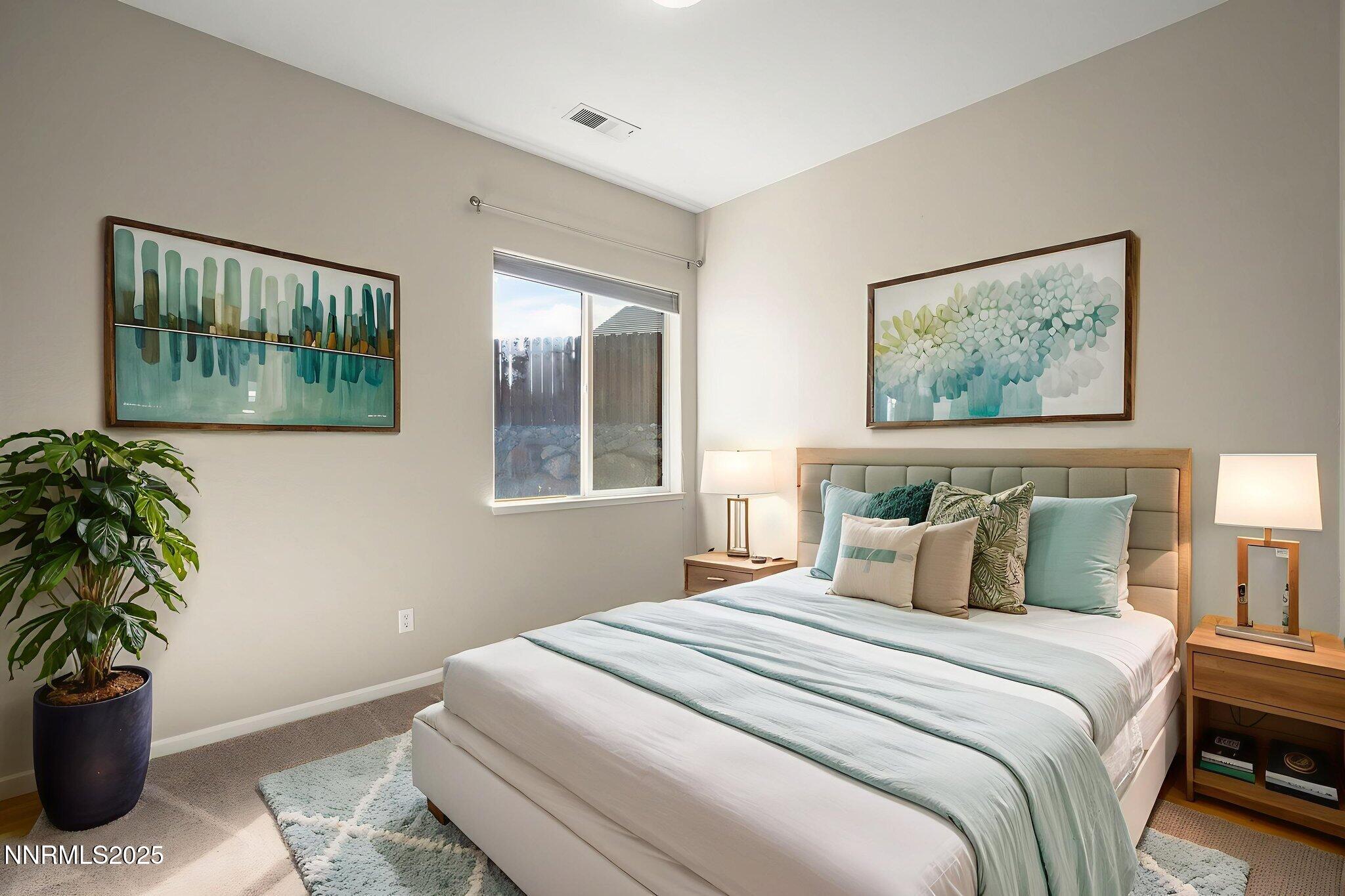 5502 New Mexico Court Reno, NV 89511 - Photo 30 of 55 a bedroom with bed and a window