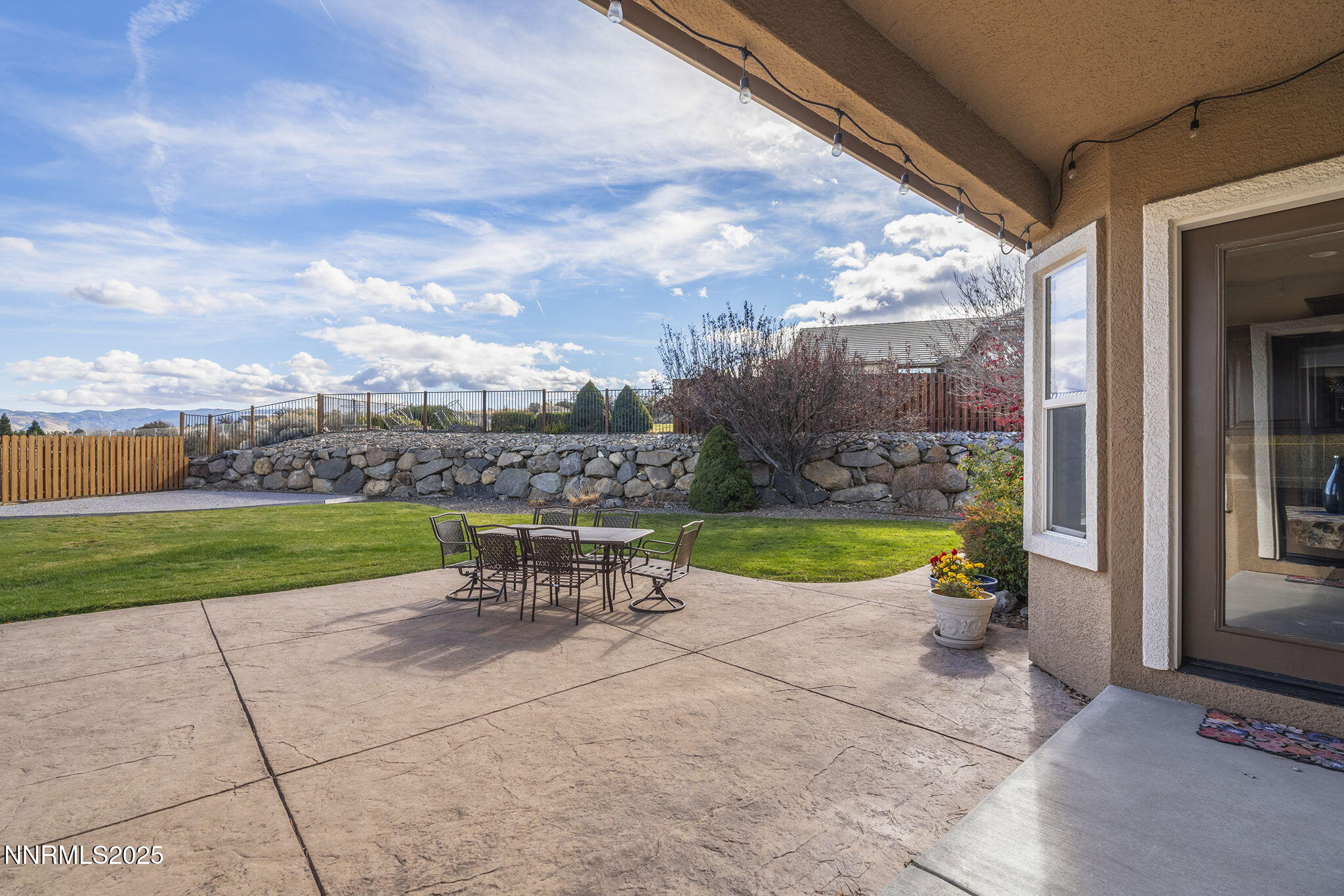 5502 New Mexico Court Reno, NV 89511 - Photo 35 of 55 a view of a swimming pool with a patio