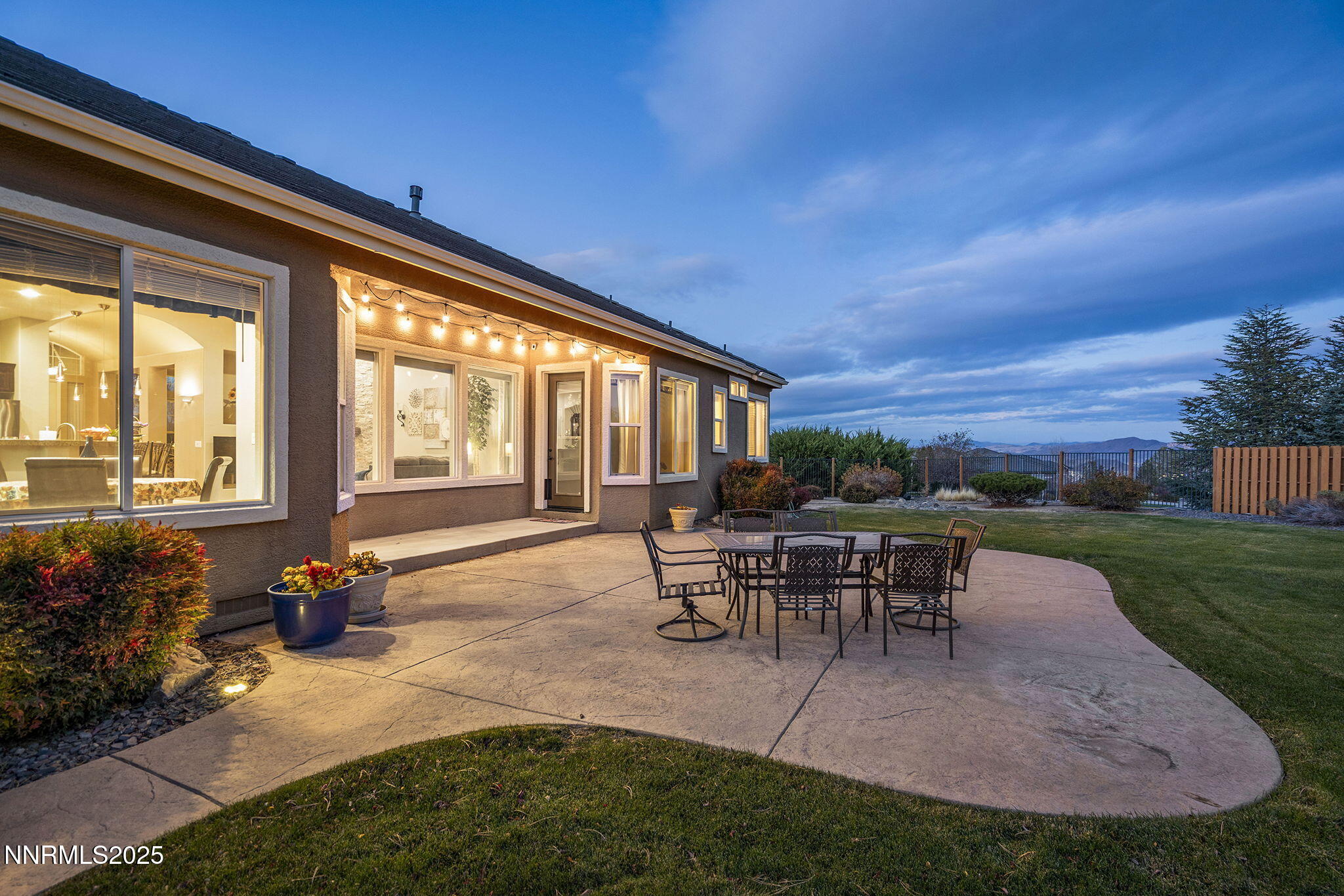 5502 New Mexico Court Reno, NV 89511 - Photo 37 of 55 a view of a house with backyard and sitting area