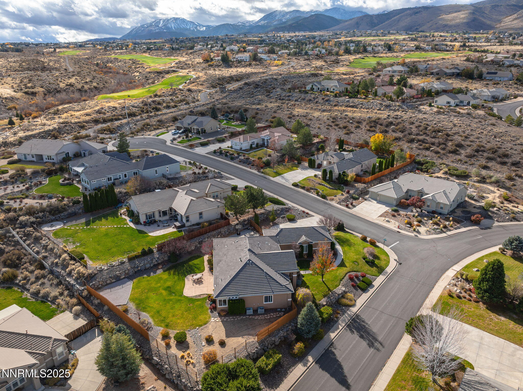 5502 New Mexico Court Reno, NV 89511 - Photo 54 of 55 an aerial view of residential houses with outdoor space