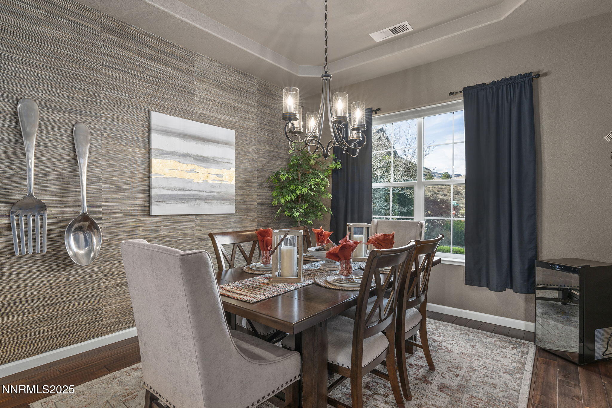 5502 New Mexico Court Reno, NV 89511 - Photo 7 of 55 a view of a dining room with furniture window and outside view