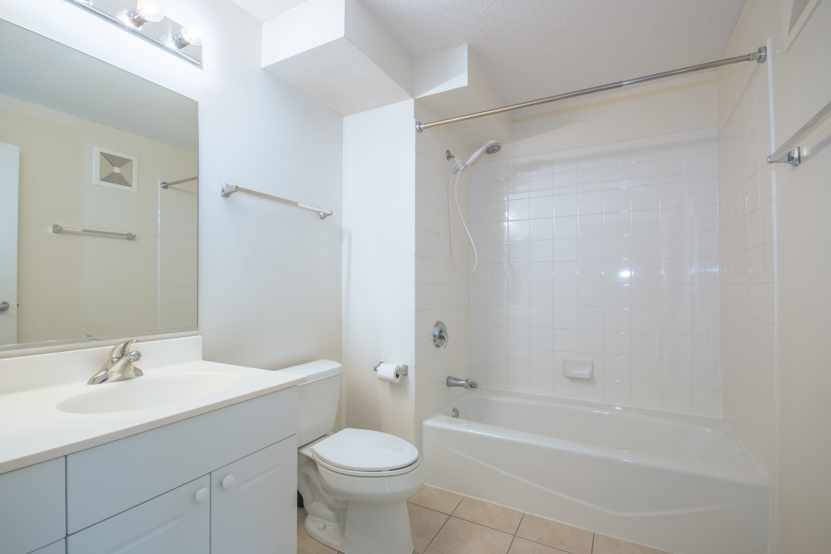 800 Elgin Road, Unit 1206 Evanston, IL 60201 - Photo 16 of 18 a bathroom with a sink toilet and shower