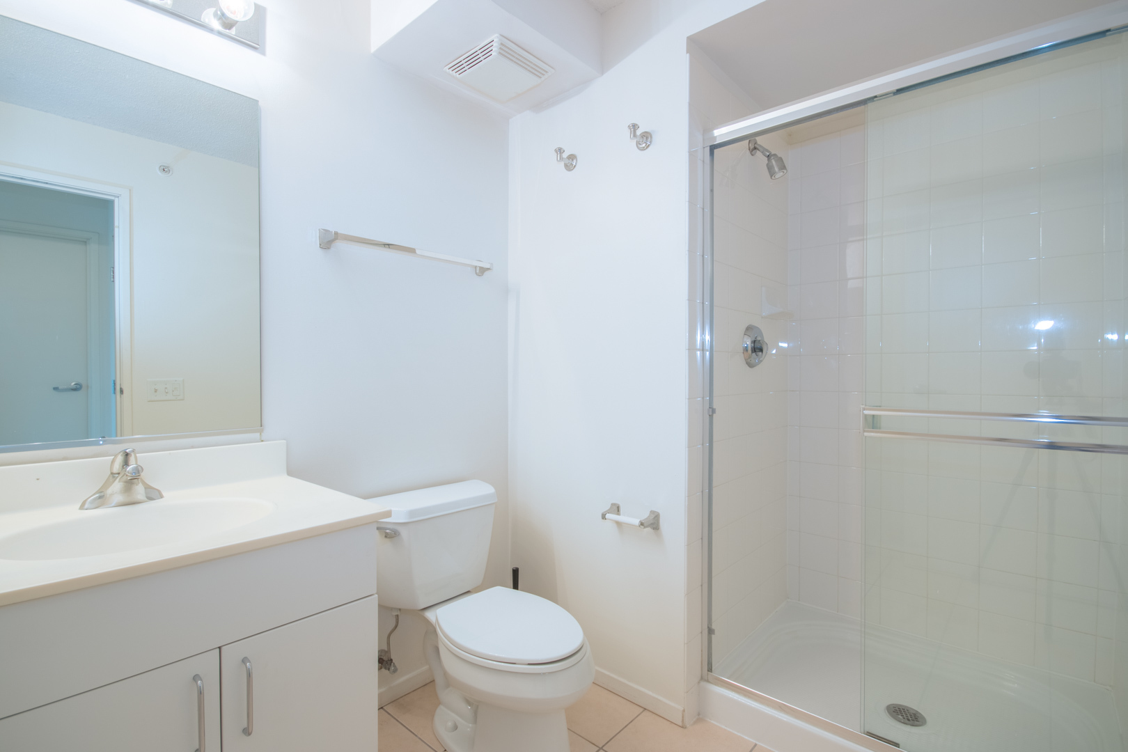 800 Elgin Road, Unit 1206 Evanston, IL 60201 - Photo 17 of 18 a bathroom with a sink toilet and shower