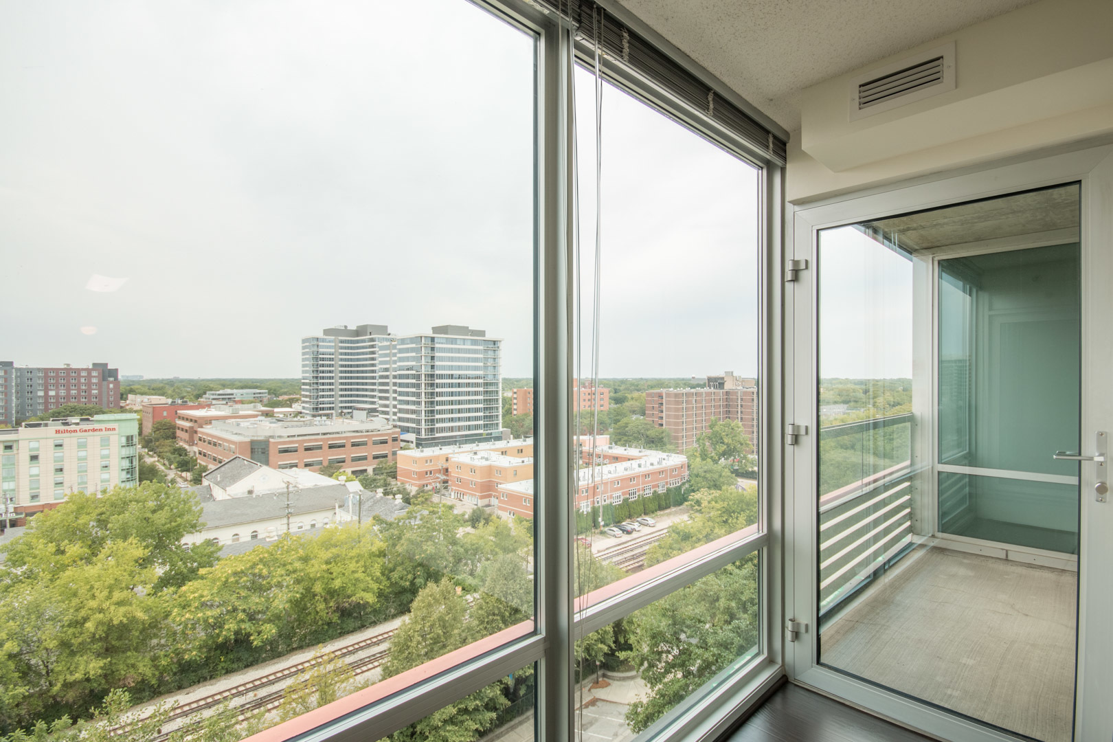 800 Elgin Road, Unit 1206 Evanston, IL 60201 - Photo 9 of 18 a view of a city from a window