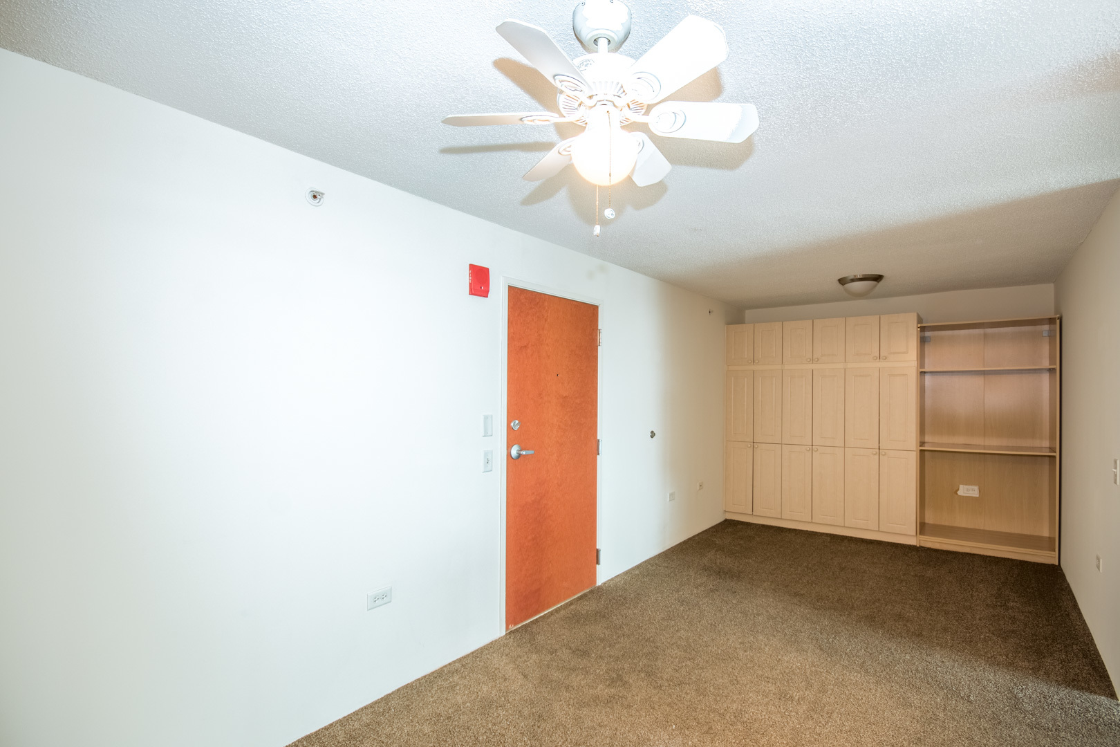 800 Elgin Road, Unit 1206 Evanston, IL 60201 - Photo 10 of 18 a view of a livingroom with a chandelier