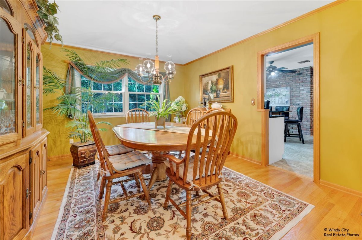 3007 NW Road Marengo, IL 60152 - Photo 8 of 31 a view of a dining room with furniture window and wooden floor
