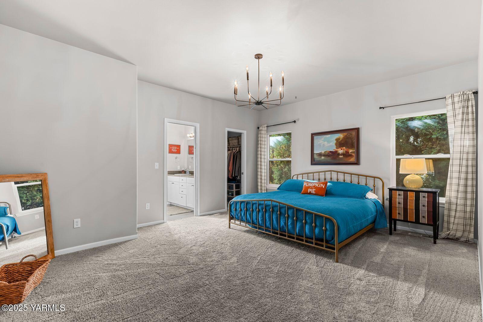 115 Apple Loop Naches, WA 98937 - Photo 21 of 48 a living room with a bed furniture and a window