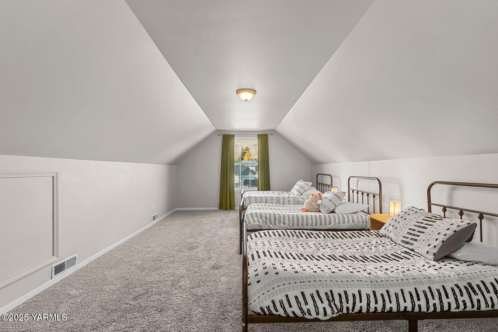 115 Apple Loop Naches, WA 98937 - Photo 30 of 48 a bedroom with a bed and window