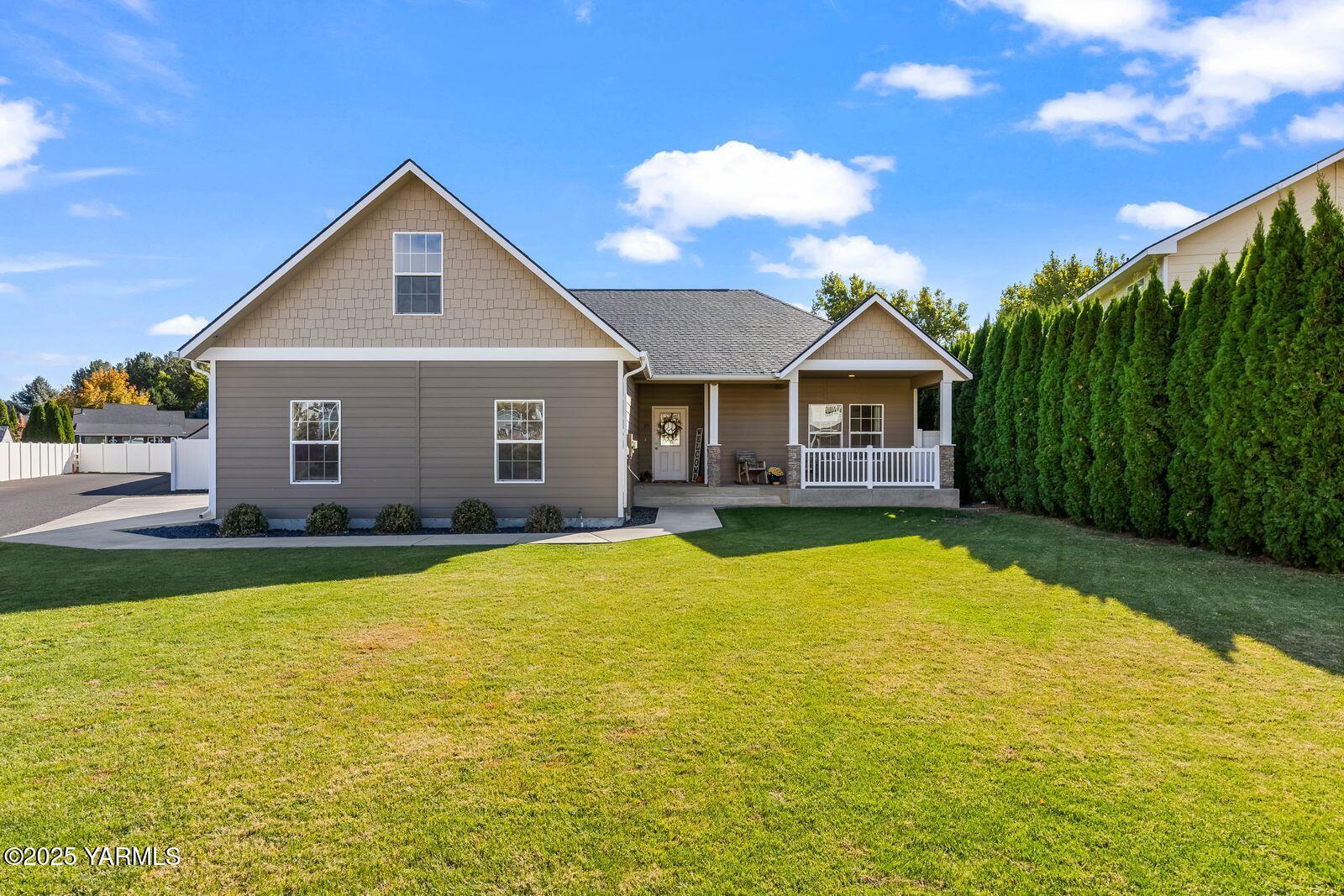 115 Apple Loop Naches, WA 98937 - Photo 3 of 48 a view of a house with pool and a yard