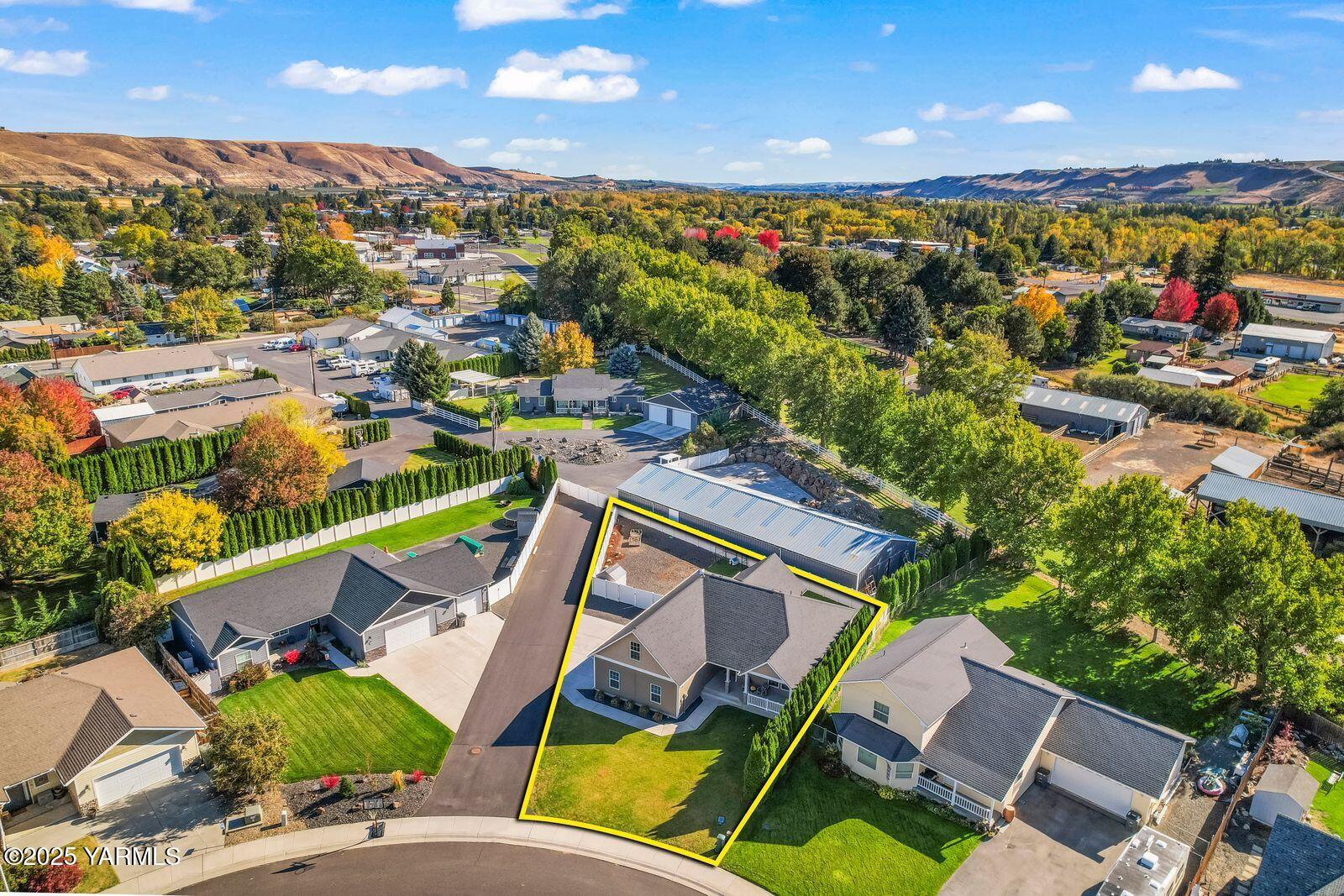 115 Apple Loop Naches, WA 98937 - Photo 38 of 48 an aerial view of residential houses with outdoor space and trees