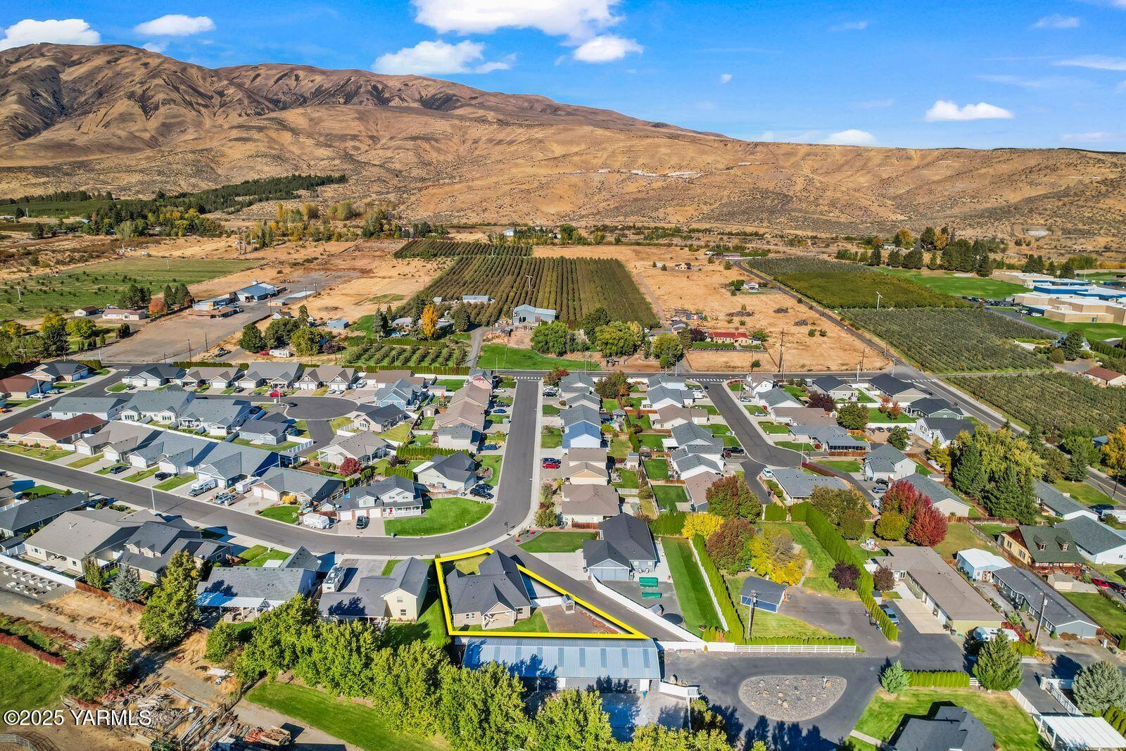 115 Apple Loop Naches, WA 98937 - Photo 40 of 48 a view of a city with mountains in the background