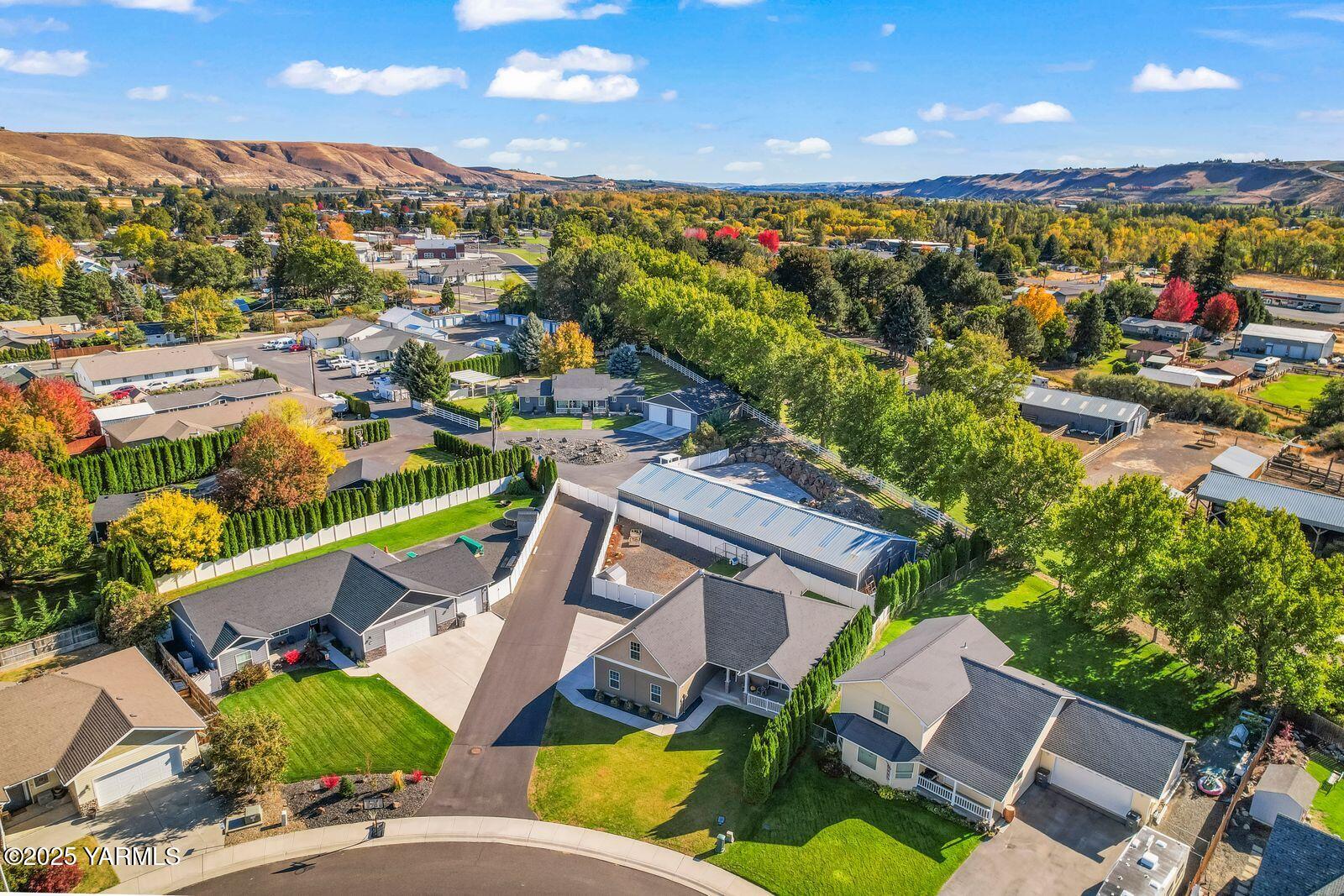 115 Apple Loop Naches, WA 98937 - Photo 44 of 48 an aerial view of residential houses with outdoor space and street view