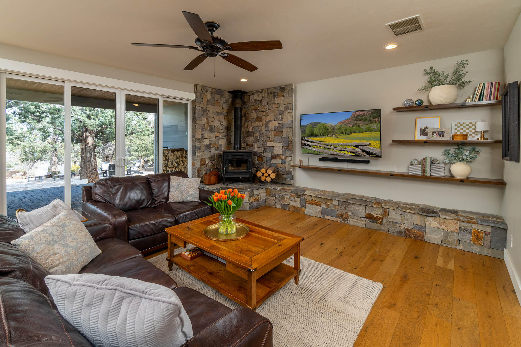 23160 Rickard Road Bend, OR 97702 - Photo 6 of 48 Large hearth area, opens to covered patio