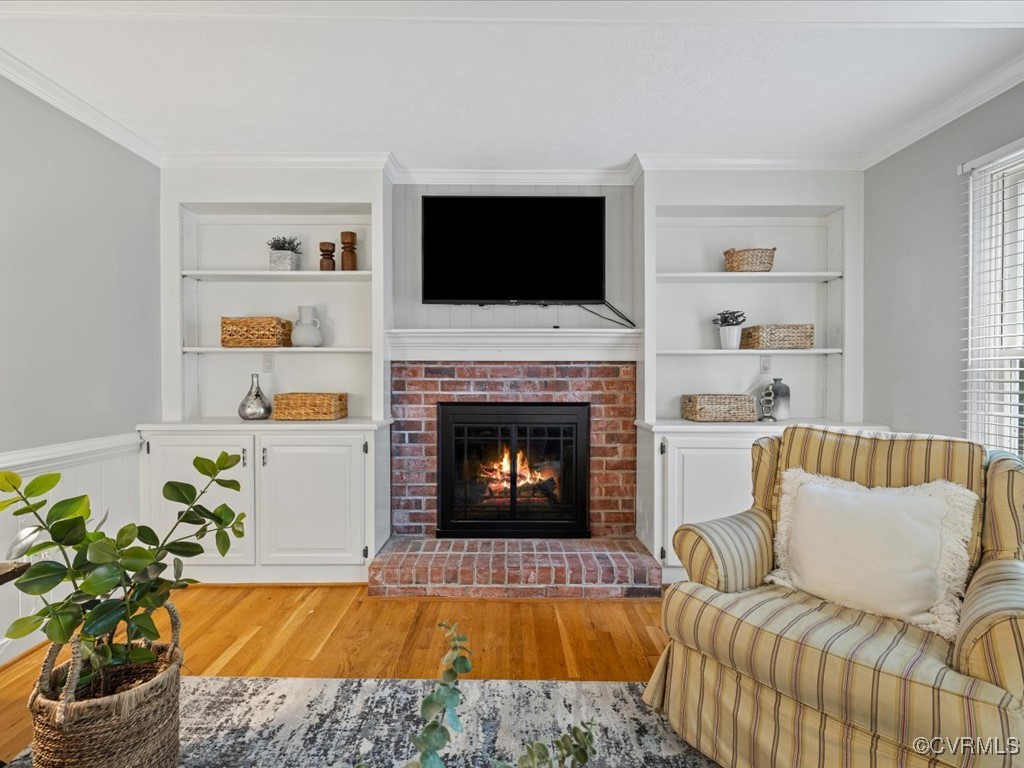 1519 Kingscross Road Midlothian, VA 23114 - Photo 14 of 50 a living room with a fireplace and a flat screen tv