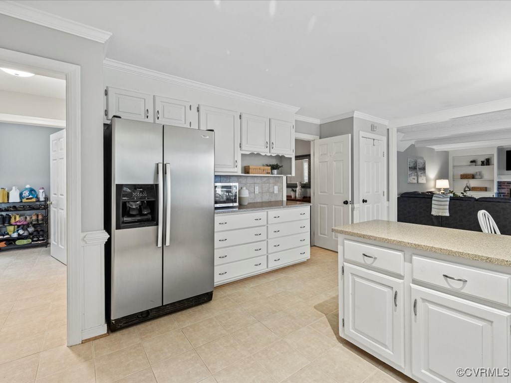 1519 Kingscross Road Midlothian, VA 23114 - Photo 25 of 50 a kitchen with white cabinets and refrigerator