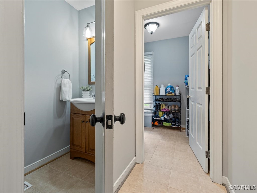 1519 Kingscross Road Midlothian, VA 23114 - Photo 26 of 50 a view of a hallway with closet and a yard