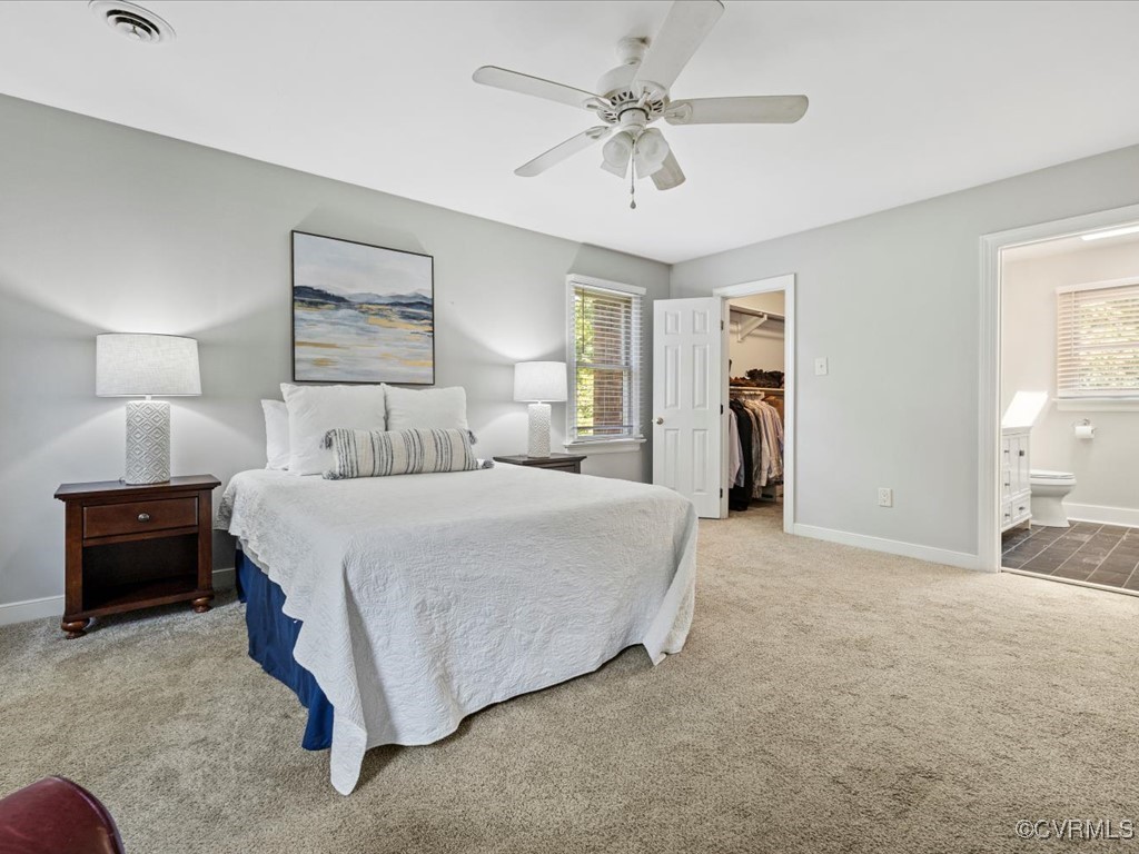 1519 Kingscross Road Midlothian, VA 23114 - Photo 33 of 50 a spacious bedroom with a bed and a chandelier