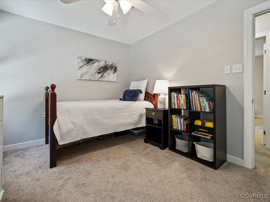 1519 Kingscross Road Midlothian, VA 23114 - Photo 40 of 50 a bedroom with a bed and a book shelf