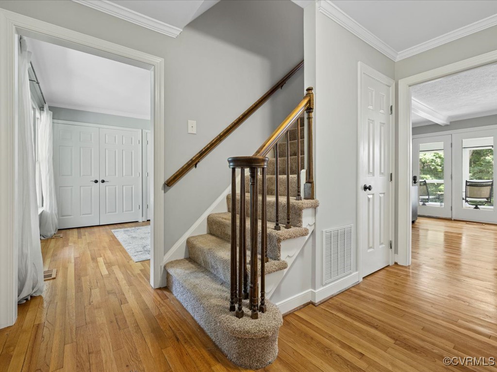 1519 Kingscross Road Midlothian, VA 23114 - Photo 6 of 50 a view of entryway with wooden floor and stairs