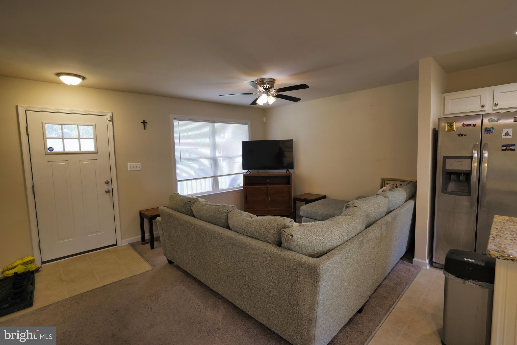48 Rustic Lane Colonial Beach, VA 22443 - Photo 25 of 47 a living room with furniture and a flat screen tv