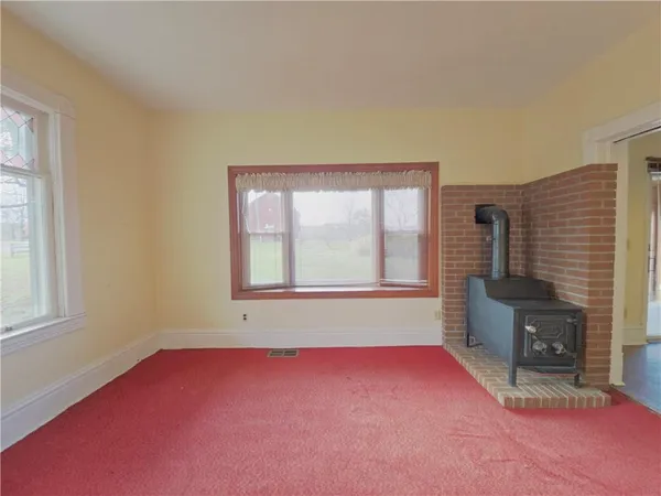 an empty room with windows