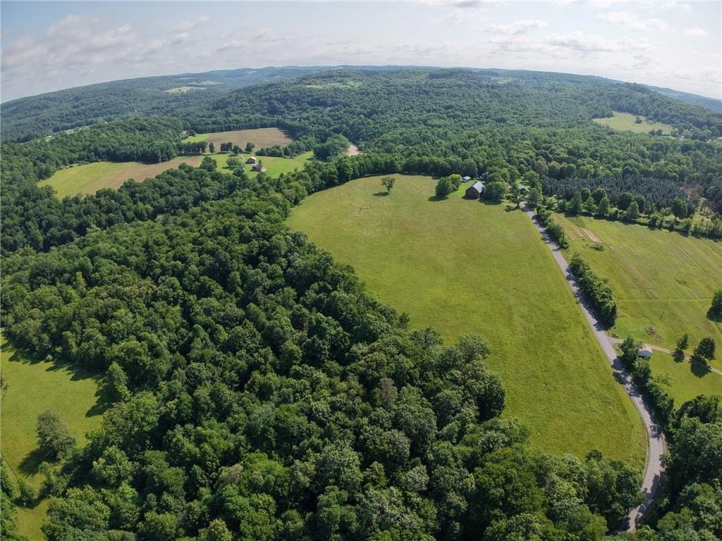 273 Government Road New Bethlehem, PA 16242 - Photo 28 of 33 an aerial view of residential houses with outdoor space and trees all around