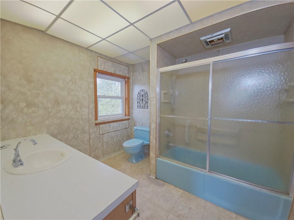 273 Government Road New Bethlehem, PA 16242 - Photo 10 of 33 a bathroom with a sink toilet and shower