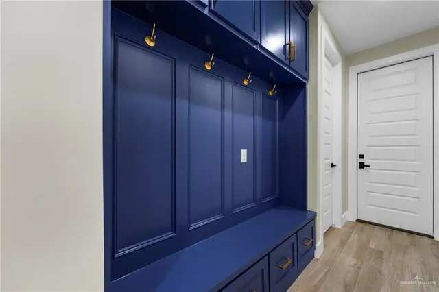 a view of hallway with granite countertop