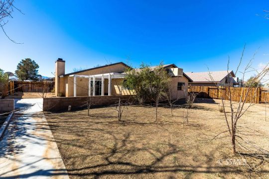 732 South Chesapeake Street Ridgecrest, CA 93555 - Photo 28 of 28 a front view of a house with a yard