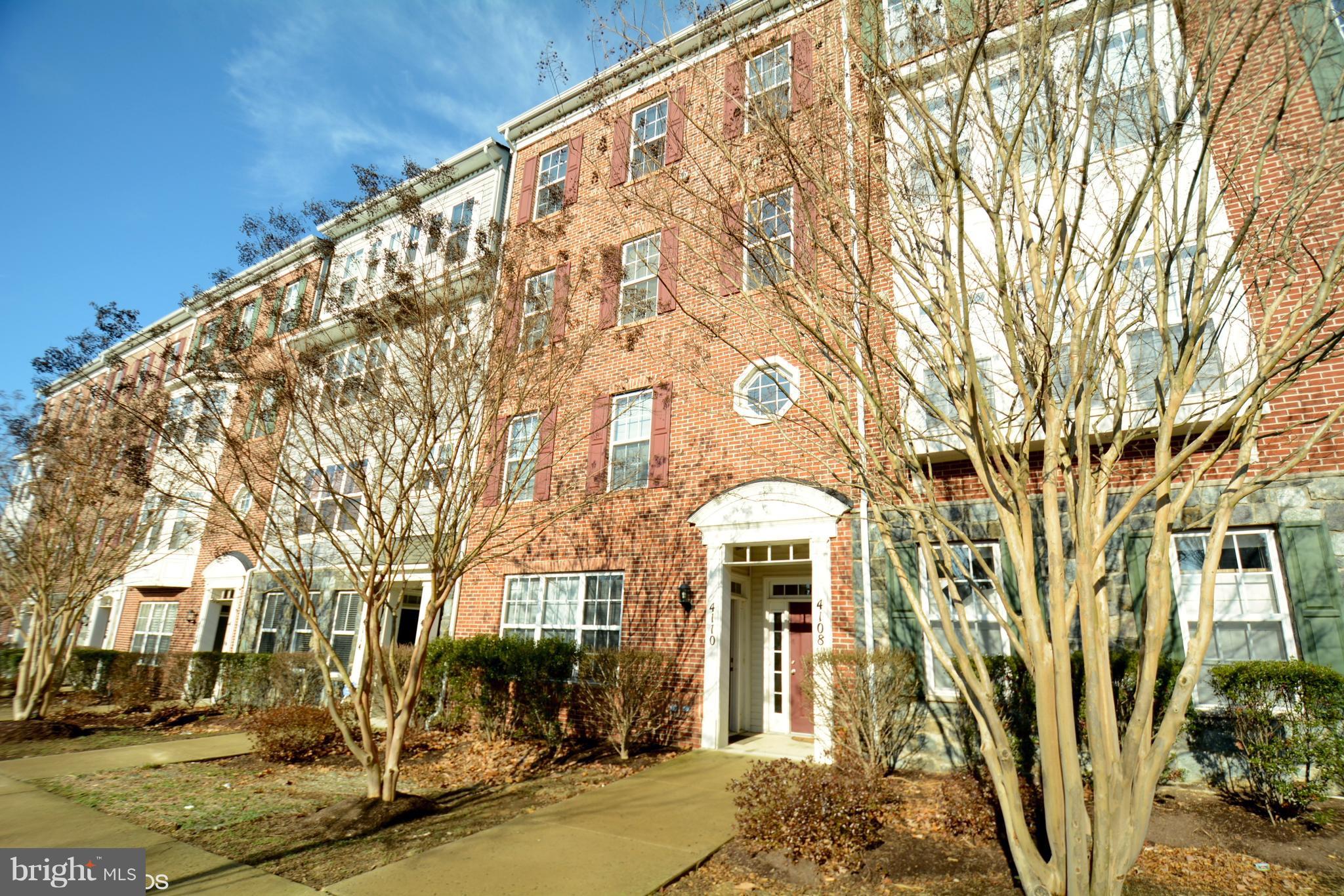 4110 Potomac Highlands Circle, Unit 5 Triangle, VA 22172 - Photo 1 of 24 a front view of a building