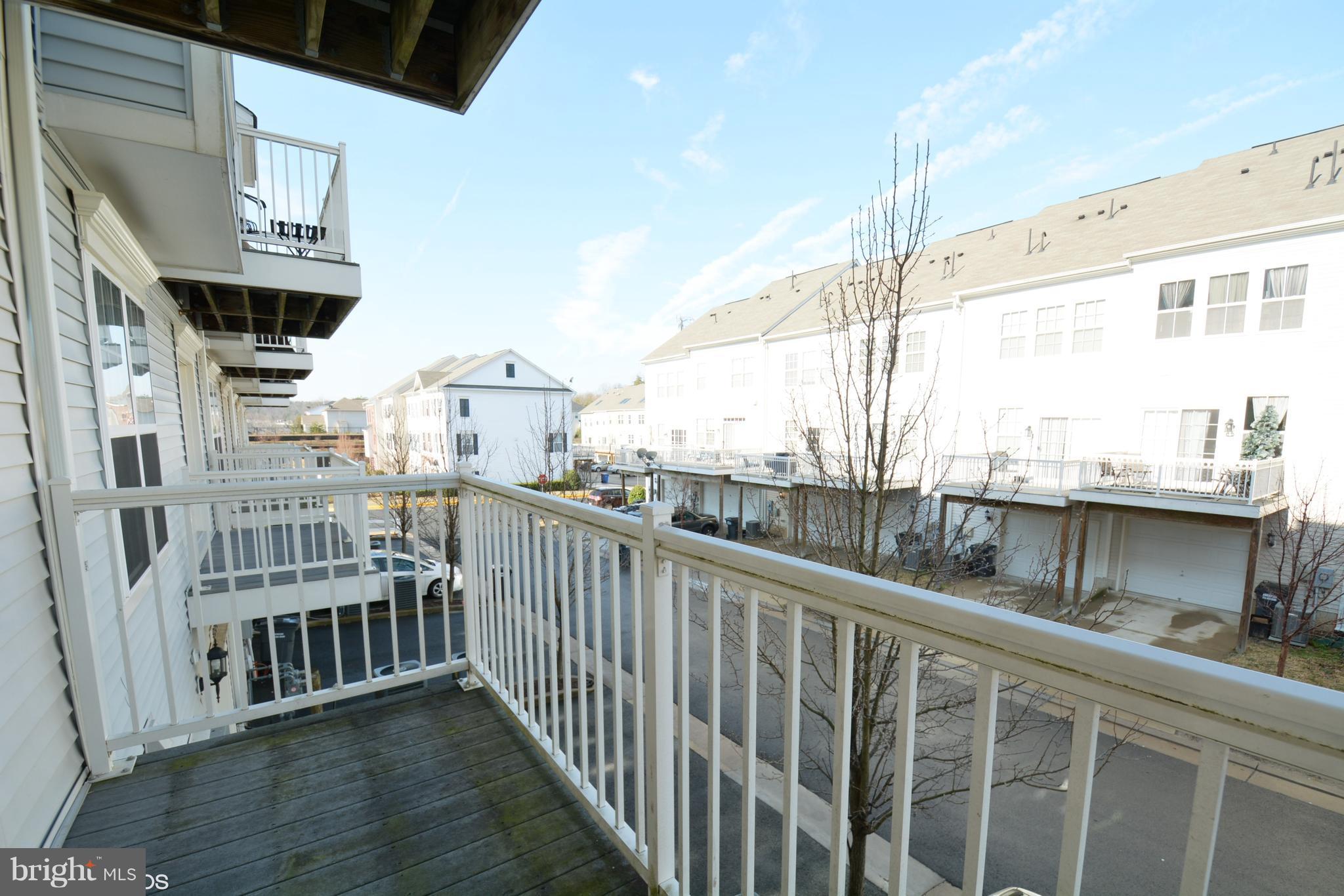 4110 Potomac Highlands Circle, Unit 5 Triangle, VA 22172 - Photo 24 of 24 a view of a balcony with furniture
