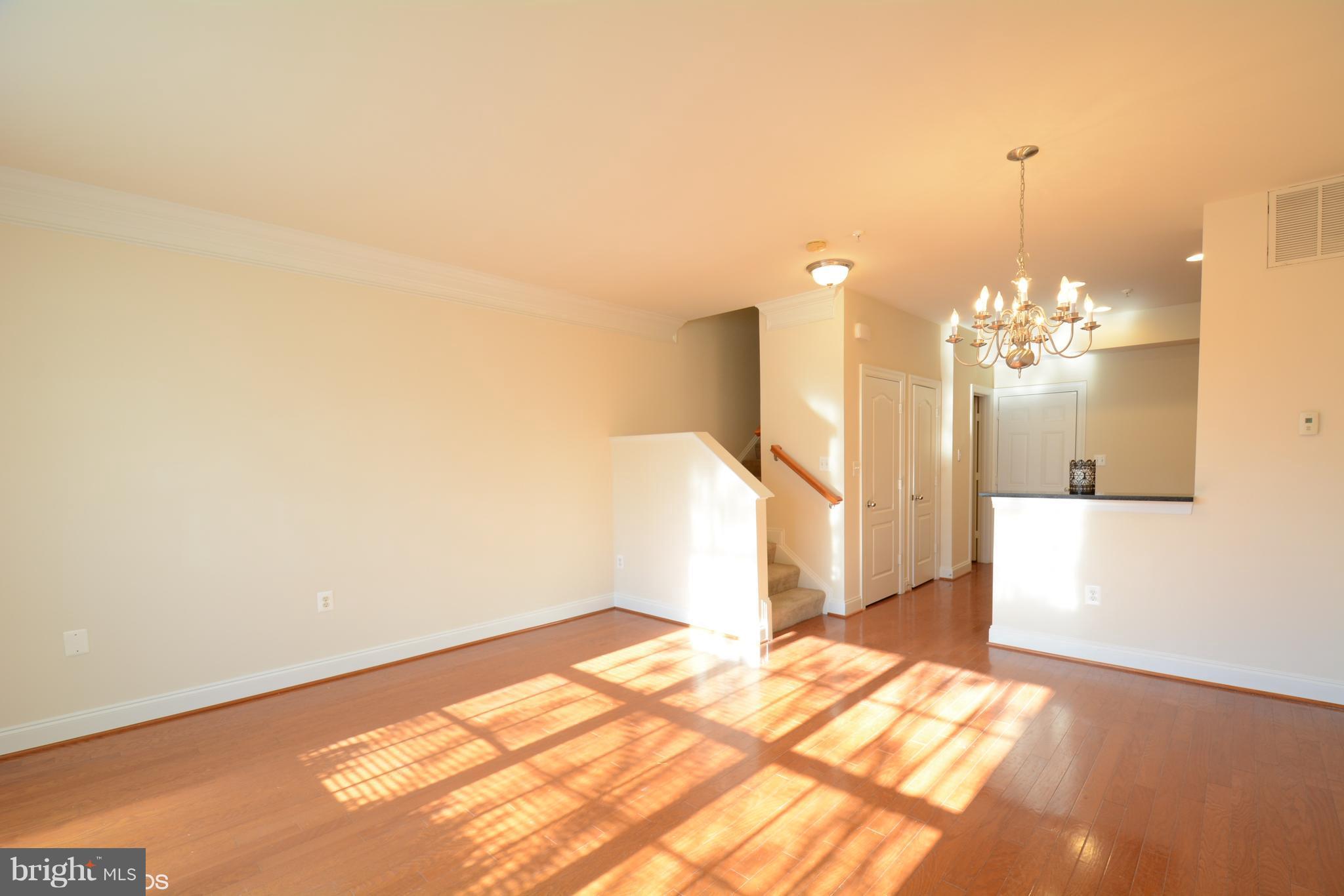 4110 Potomac Highlands Circle, Unit 5 Triangle, VA 22172 - Photo 4 of 24 a view of a chandelier in a room