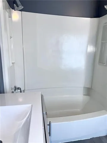 a bathroom with a bathtub