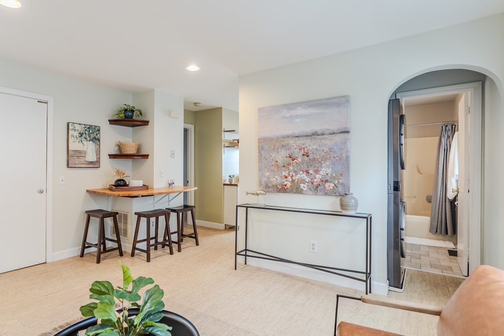 9 Walnut Street, Unit B Northampton, MA 01060 - Photo 5 of 25 a dining room with furniture and window