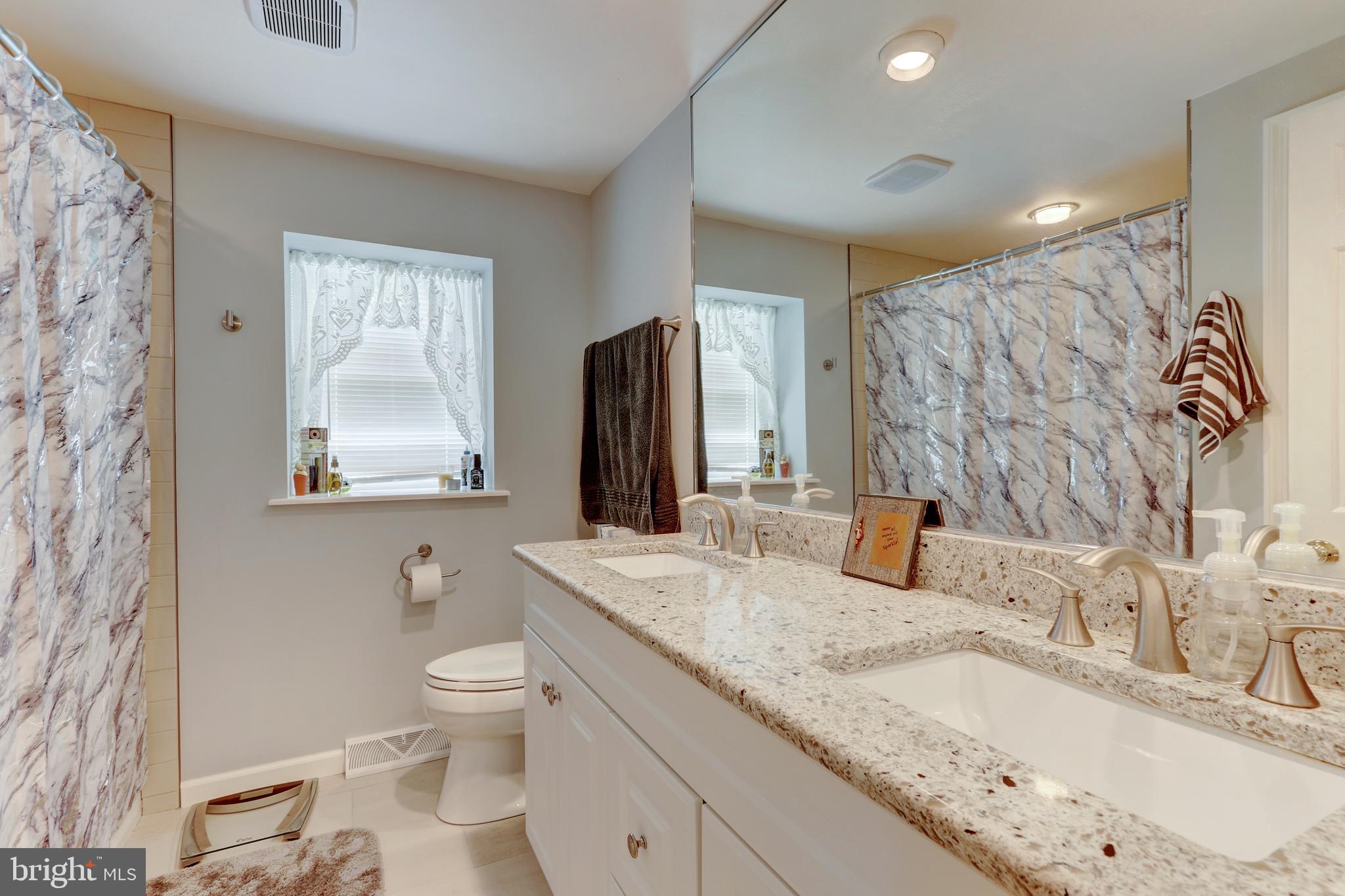 8 Thornbury Road Reading, PA 19606 - Photo 32 of 49 hall bathroom w/ tub