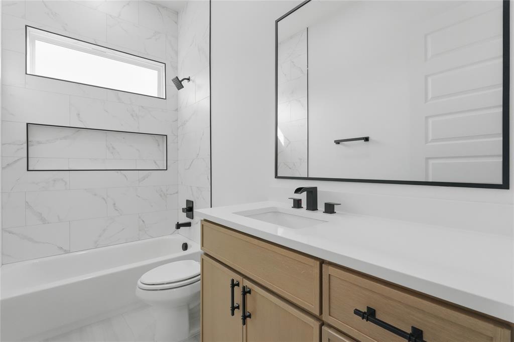 7817 Red Spring Road Dallas, TX 75241 - Photo 16 of 23 Full bath featuring vanity and shower / bath combination