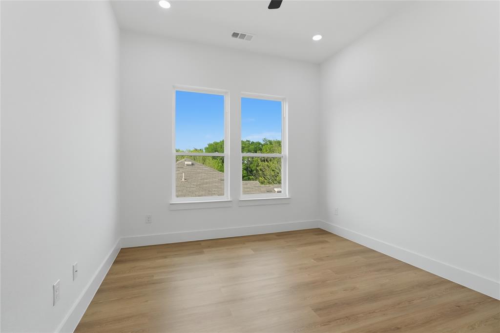 7817 Red Spring Road Dallas, TX 75241 - Photo 18 of 23 Spare room with light wood-style floors, recessed lighting, and ceiling fan