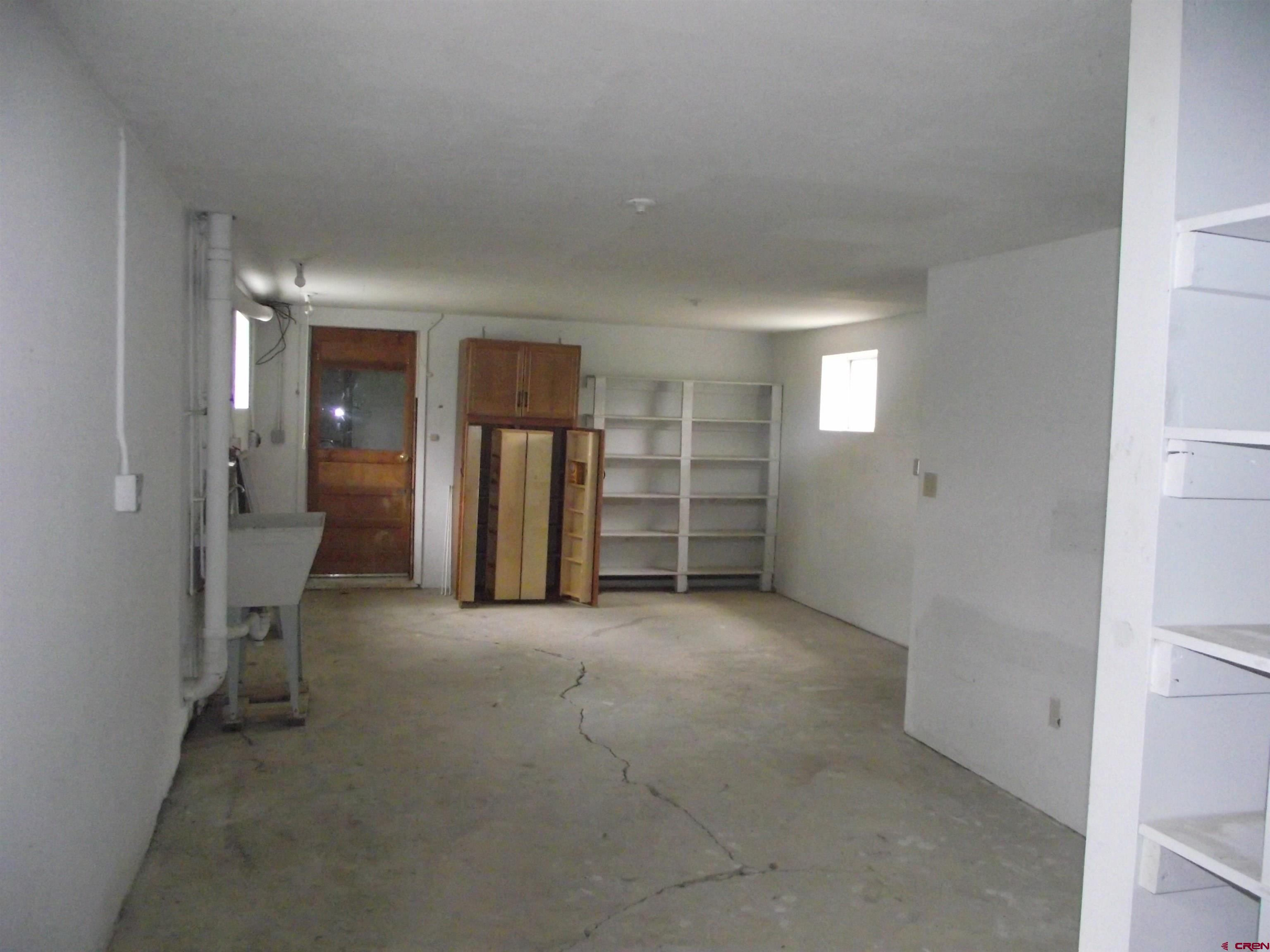 42996 Needle Rock Road Crawford, CO 81415 - Photo 35 of 45 an empty room with closet and a window