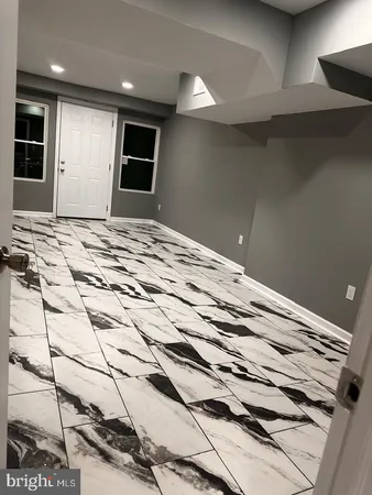 a kitchen with a stove and a microwave