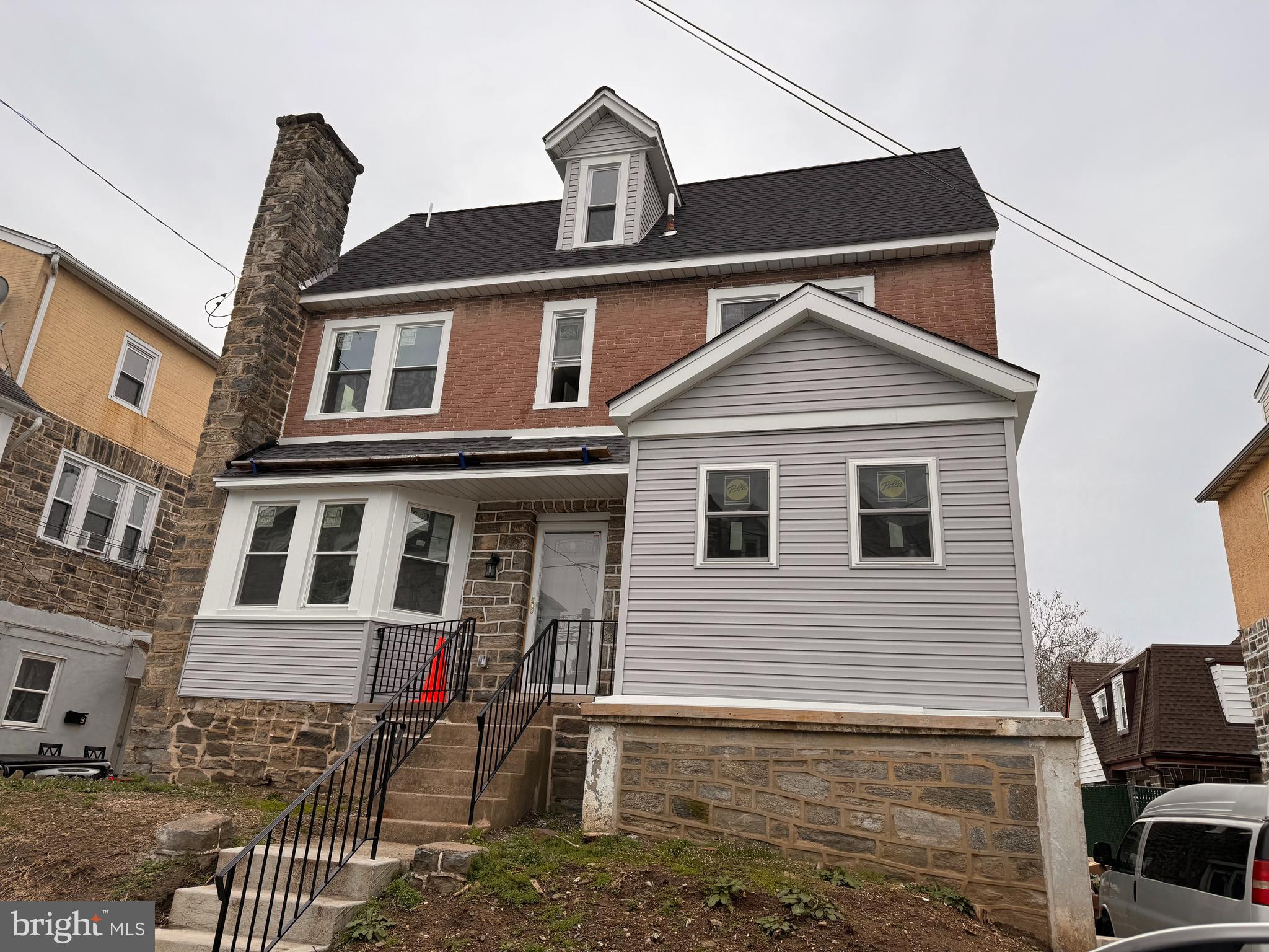 32 Kent Road Upper Darby, PA 19082 - Photo 2 of 60 a front view of a house with a yard