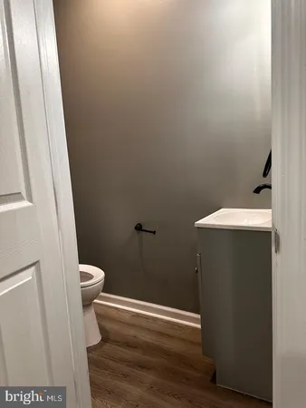 a view of a kitchen from the hallway