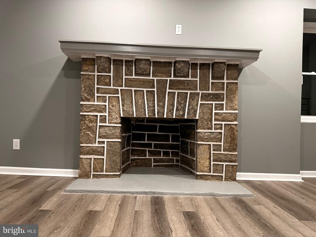 32 Kent Road Upper Darby, PA 19082 - Photo 33 of 60 a view of empty room with wooden floor and windows