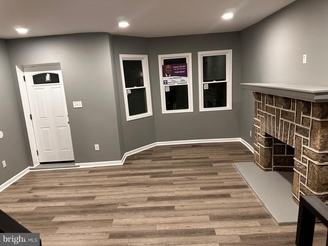 32 Kent Road Upper Darby, PA 19082 - Photo 34 of 60 a view of a livingroom with wooden floor and windows