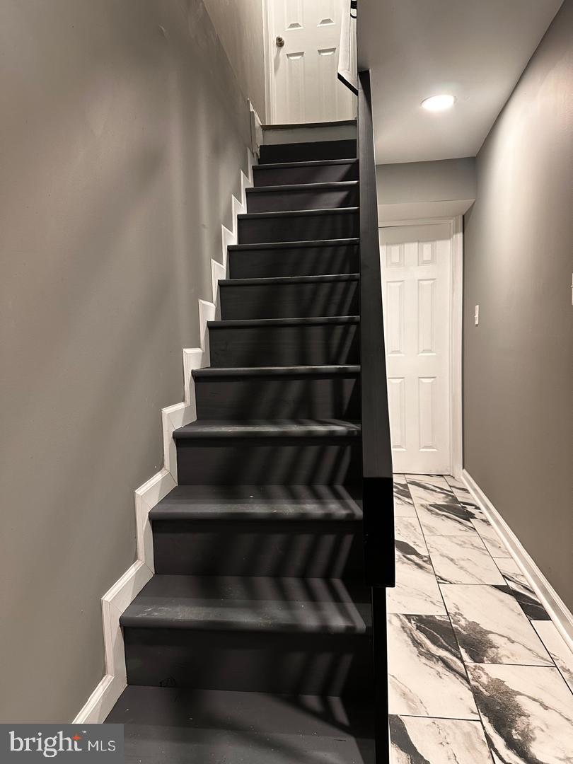 32 Kent Road Upper Darby, PA 19082 - Photo 5 of 60 Stairs leading down the finished basement