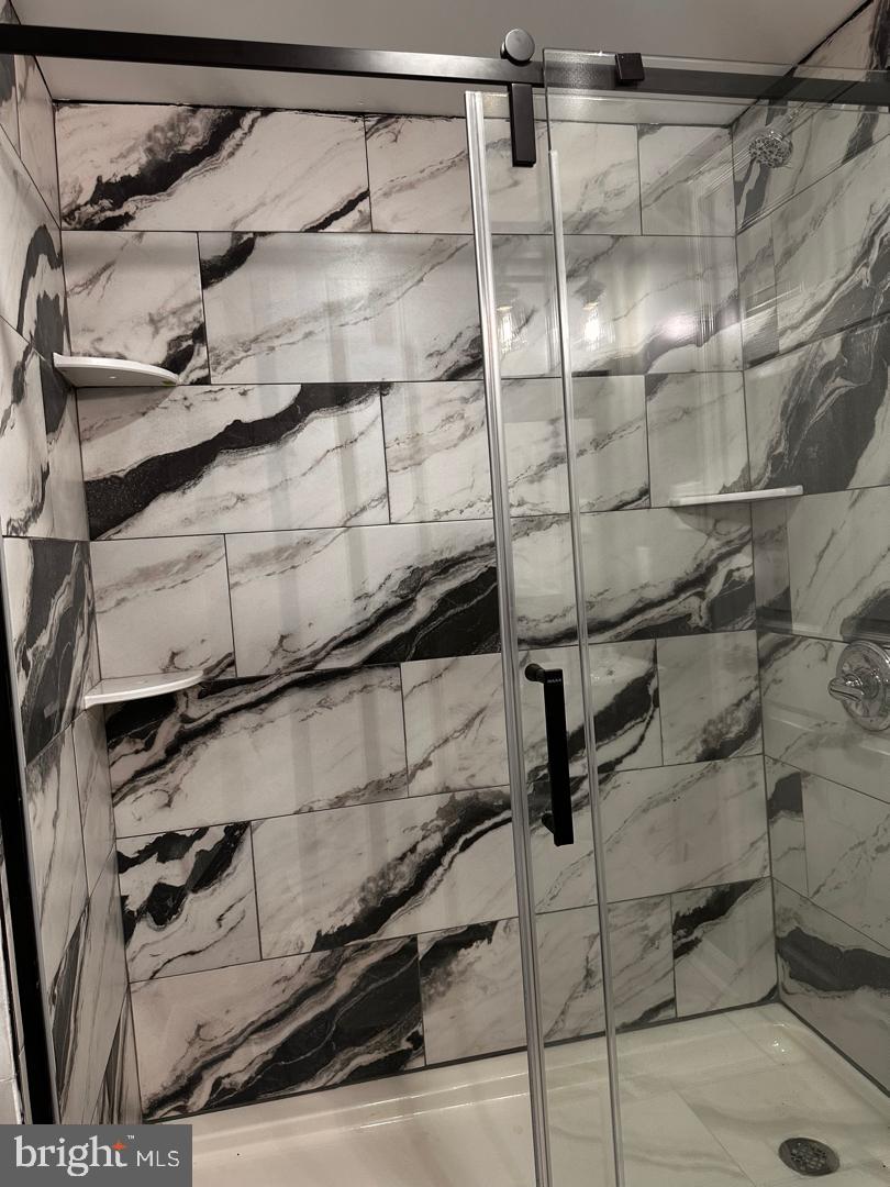 32 Kent Road Upper Darby, PA 19082 - Photo 55 of 60 a bathroom with a shower