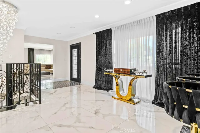 a view of a livingroom with furniture and front door