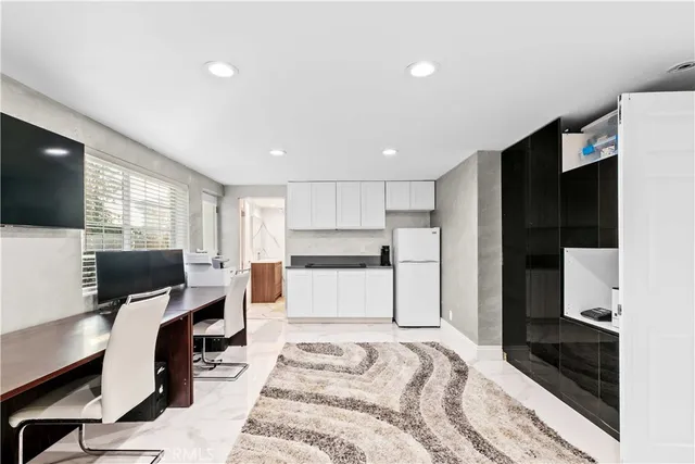 a view of entryway and workspace