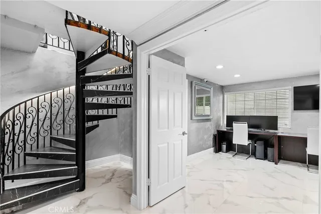 a view of living room with furniture and window