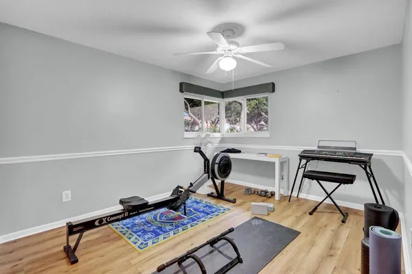 a workspace with furniture and window