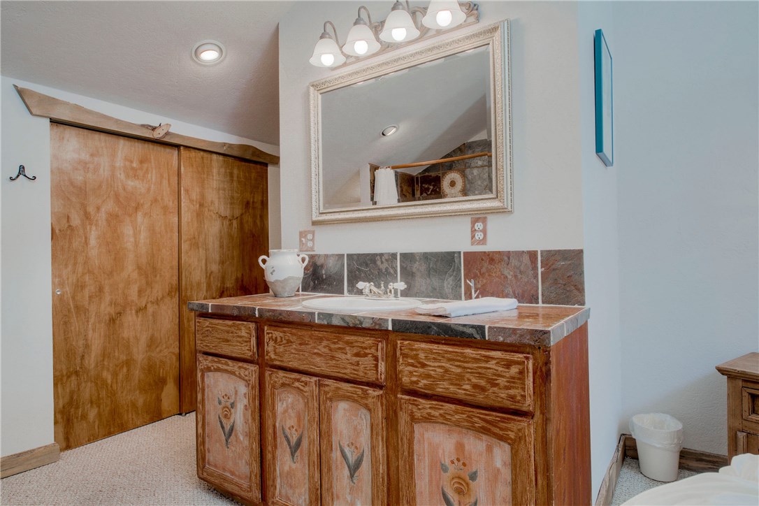 9460 Ryan Gulch Road, Unit 60 Silverthorne, CO 80498 - Photo 15 of 34 Master Bathroom